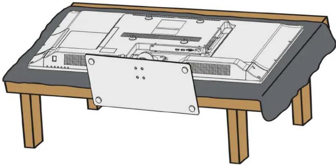 Illustration of a computer setup with an open chassis and a metal bracket, no text or symbols present.