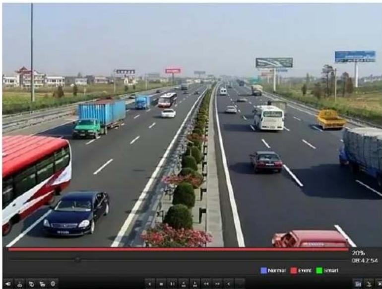 Street photo of a multi-lane highway with vehicles and traffic, captured by video editing software interface showing status bar and timestamp.