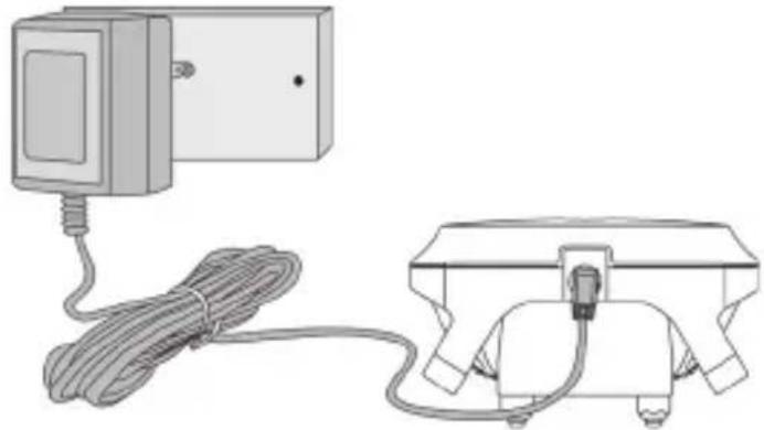 Illustration of a portable electrical device connected to a cable and a mechanical clamp (no text or symbols)