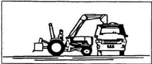 Line drawing of a front-end loader and truck (no text or symbols).