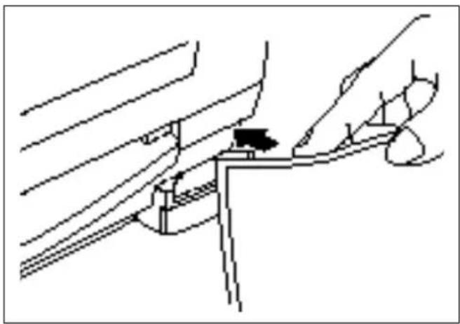 Line drawing of a hand holding a tool interacting with a mechanical bracket (no text or symbols)