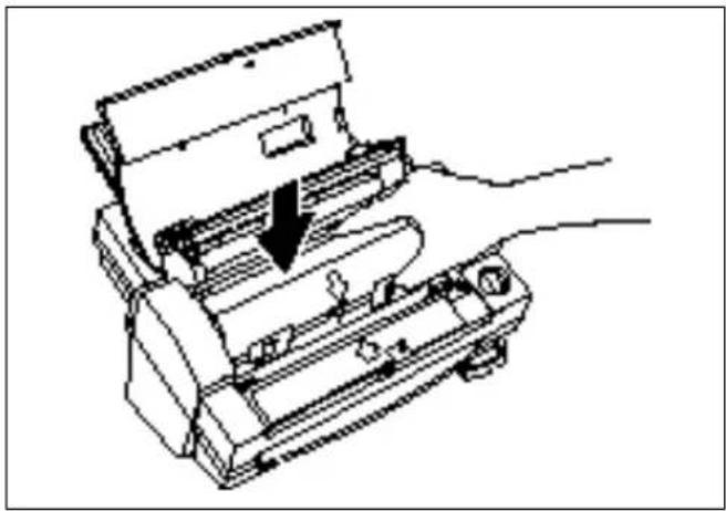 Line drawing of a printer or printer with a hand inserting a paper into it, showing no text or symbols.