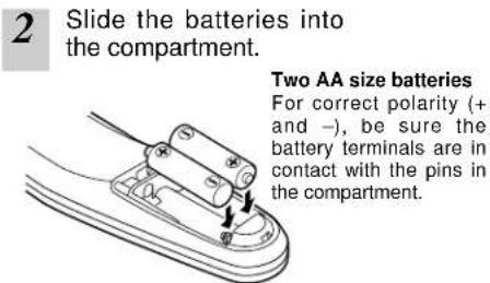 2 Slide the batteries into the compartment. Two AA size batteries For correct polarity (+ and -), be sure the battery terminals are in contact with the pins in the compartment.