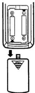 Diagram showing a battery component with labeled terminals and a small device inside, likely illustrating a physical or electrical setup.