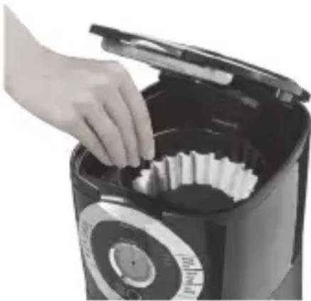 OSTER BVSTEJX33-033 - Adding Water and Ground Coffee - 6