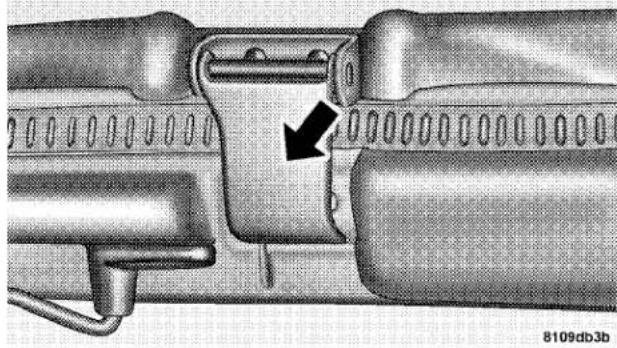 Close-up of a mechanical component with a black arrow indicating a specific part (no text or symbols present)
