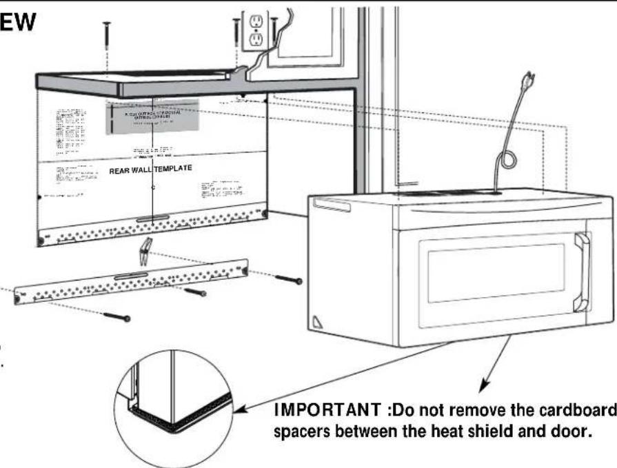 EW REAR WALL TEMPLATE IMPORTANT :Do not remove the cardboard spacers between the heat shield and door.