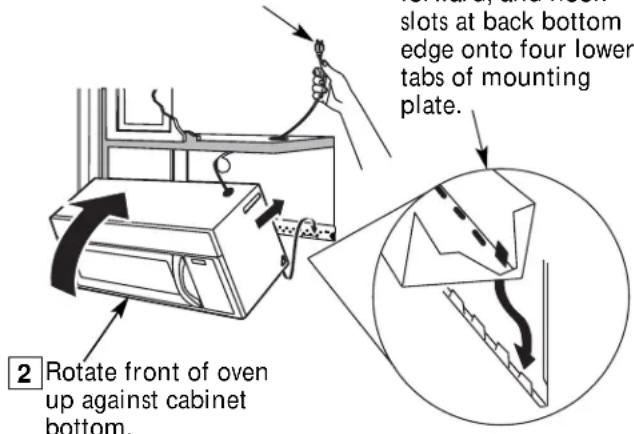 slots at back bottom edge onto four lower tabs of mounting plate. 2 Rotate front of oven up against cabinet bottom.