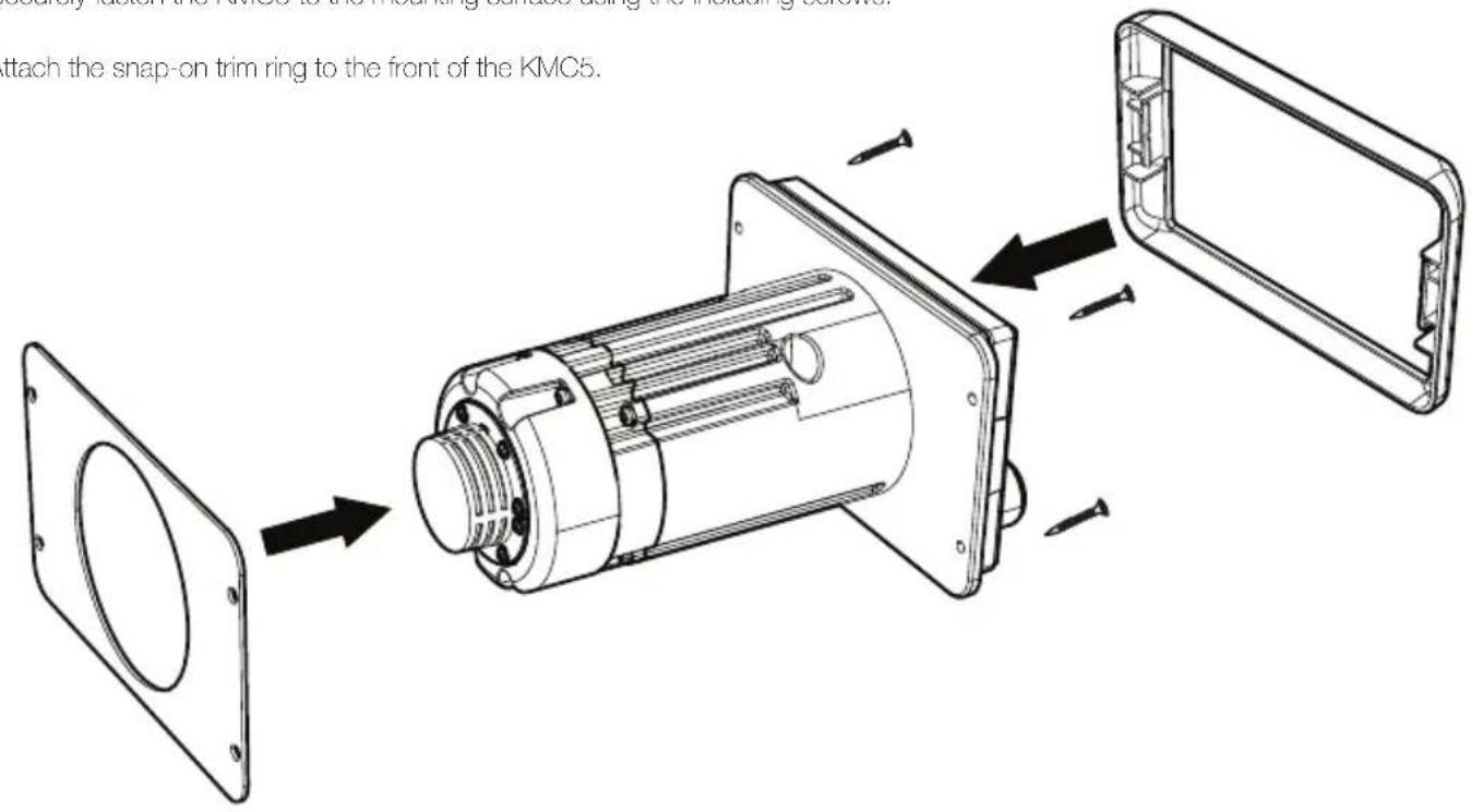 searly attach the frame to the mounting bracket using the mounting button. attach the snap-on trim ring to the front of the KMC5.