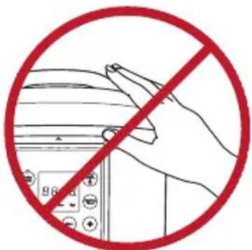 Prohibition sign showing a hand holding a device with a red circle and crossed-out lines, indicating no use or prohibition.