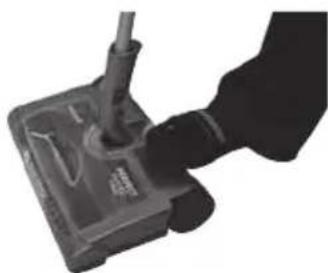 Close-up of a hand holding a small electronic device with a cylindrical port (no visible text or symbols)