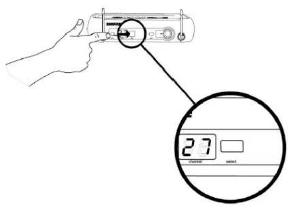 Diagram showing a hand pointing to a device with a magnified view highlighting the 2.7-hour display.