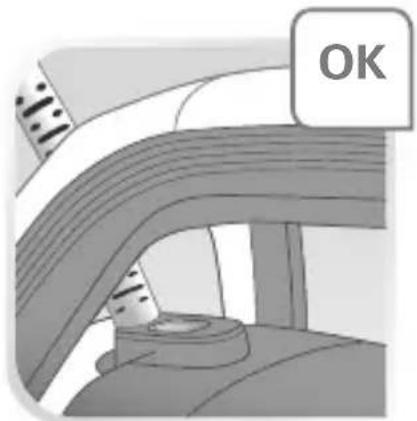 Interior view of a vehicle showing steering wheel and dashboard (no visible text or symbols)