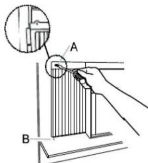 Technical diagram showing a hand holding a component labeled A and B, with an inset magnified view of a mechanical part.