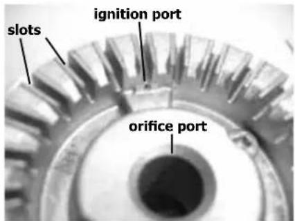 slots ignition port orifice port