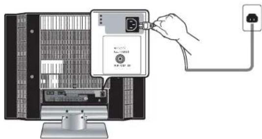Diagram showing a hand inserting a device into a computer tower, with an attached power outlet connected to the tower.
