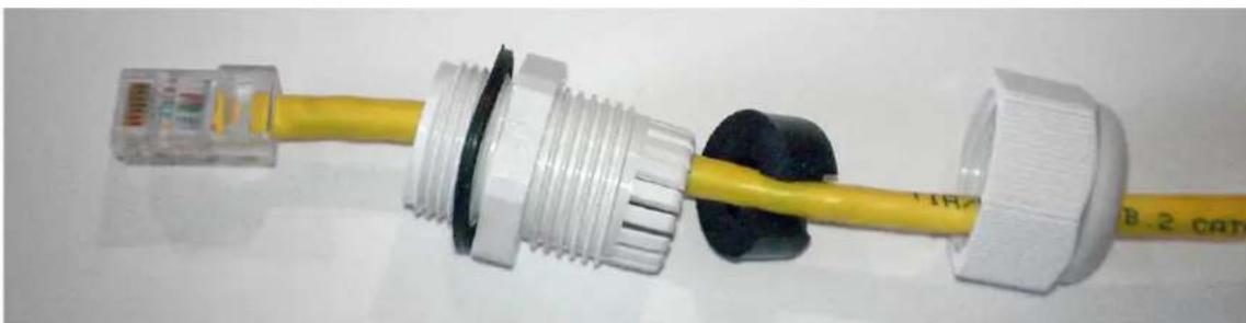 ComNet NetWave NW7 - Note: The split rubber washer allows a pre-terminated Ethernet cable to be used. - 1