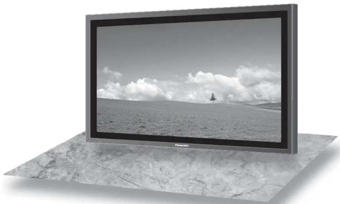 Black-and-white photo of a Panasonic TV displaying a vast landscape with a small tree on the grassy field under a cloudy sky (no text or symbols visible)