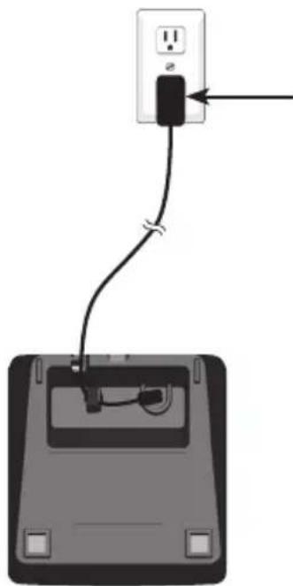 Diagram showing a plug inserted into a device with a cable, no text or symbols present