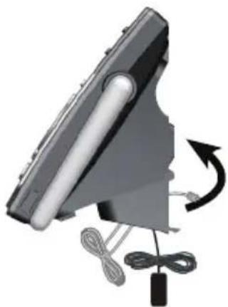 Diagram of a device with a curved arrow indicating rotation or movement, no text or symbols present