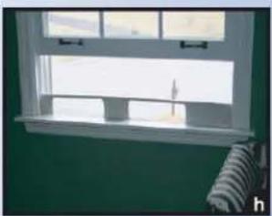 Interior view of a window with green walls and a striped patterned rug on the right (no text or symbols visible)