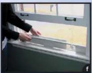 Person opening a window with visible door and window frame (no text or symbols)