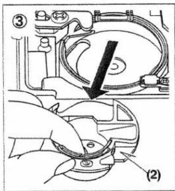 Technical diagram showing mechanical assembly with labeled parts and a downward arrow indicating direction