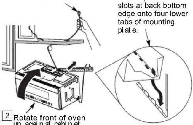 slots at back bottom edge onto four lower tabs of mounting plate e. 2 Rotate front of oven up, again st. cabin et