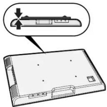 Diagram showing a device with a labeled component and an arrow indicating direction, likely illustrating a process or assembly.