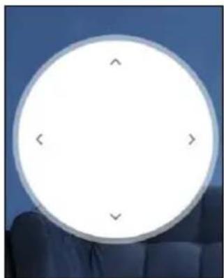 Circular white object with four corner marks against a blue background, no text or symbols visible.