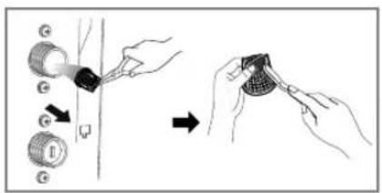 Diagram illustrating a step-by-step procedure for inserting a coin into a slot, with labeled parts and directional arrow.