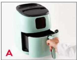 Hand holding a cooking air fryer with a handle, no visible text or symbols