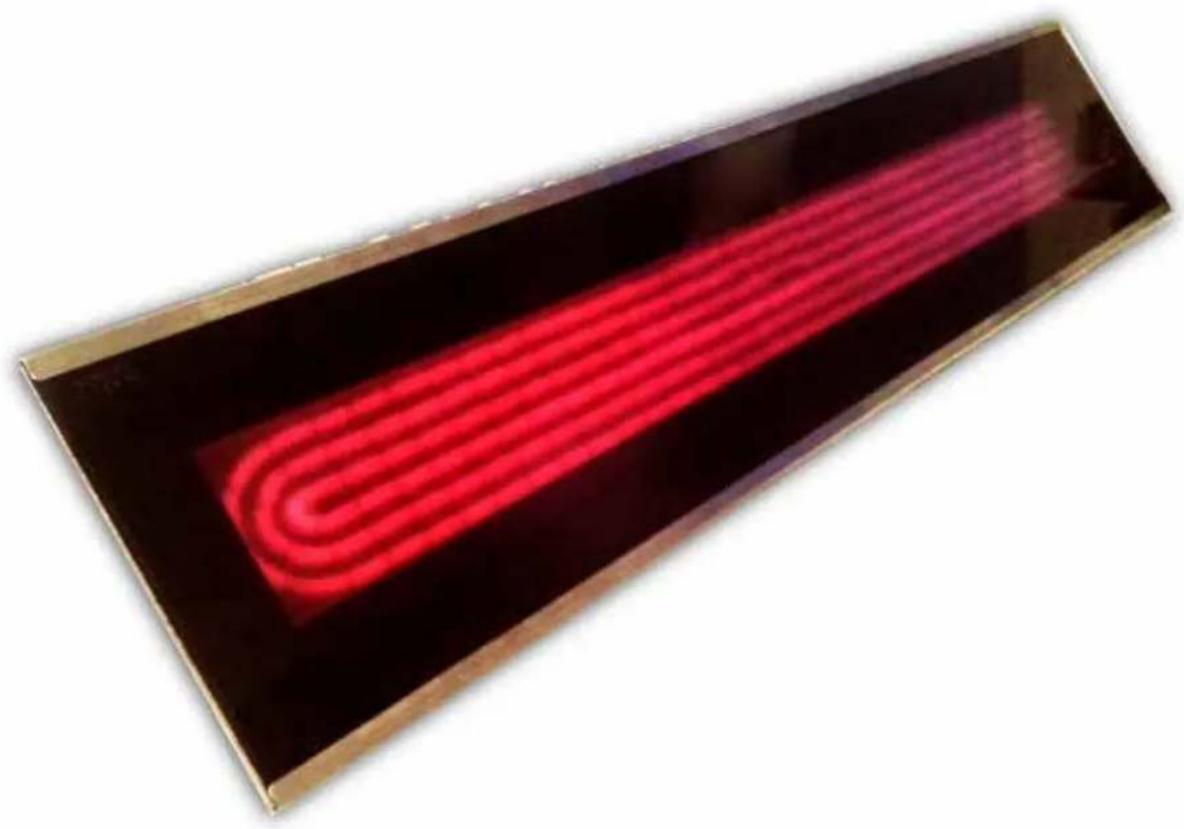Close-up of a glowing red LED display panel with curved leads, mounted on a black surface (no text or symbols visible)