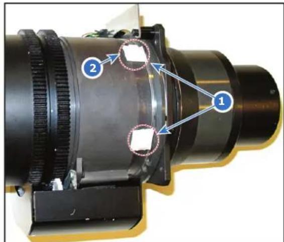 Labeled mechanical component diagram showing two numbered parts with arrows indicating alignment or assembly points.