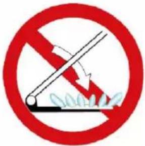 Prohibition sign indicating no smoking allowed, featuring a red circle with a diagonal line crossing through the mouth and a lightning bolt symbol.