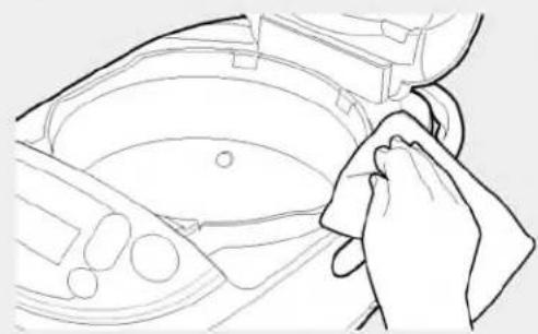 Line drawing of a hand cleaning a basin with circular fixtures (no text or symbols)
