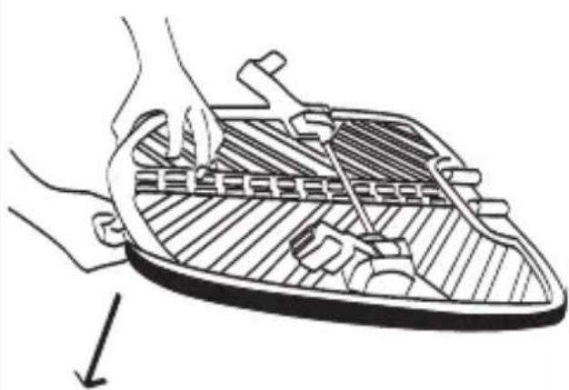 Illustration of hands using a tool to adjust or install a mechanical component on a tray (no text or symbols)