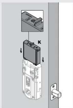 Diagram showing a device with labeled components and directional arrows indicating assembly or installation steps.