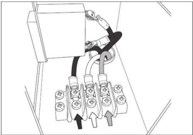 Diagram of a mechanical or electrical component with multiple connectors and arrows indicating assembly or connection (no text or symbols present)