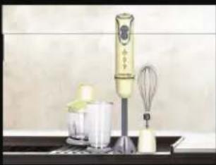 Kitchen countertop with a hand mixer and whisk (no visible text or symbols)