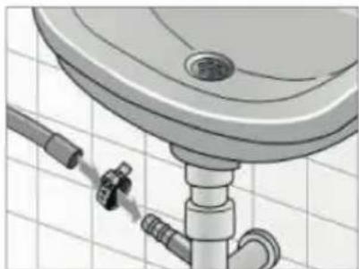 Diagram of a bathroom sink with pipe fittings and a valve, set against a tiled wall (no text or symbols)