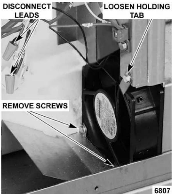 DISCONNECT LEADS LOOSEN HOLDING TAB REMOVE SCREWS 6807