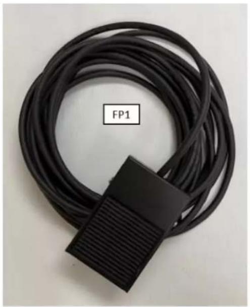 Coiled black cable with a rectangular component labeled FP1, no visible text or symbols on the main subject.
