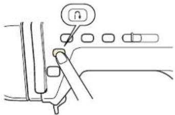 Diagram showing a car seatbelt switch with a lock icon and control buttons