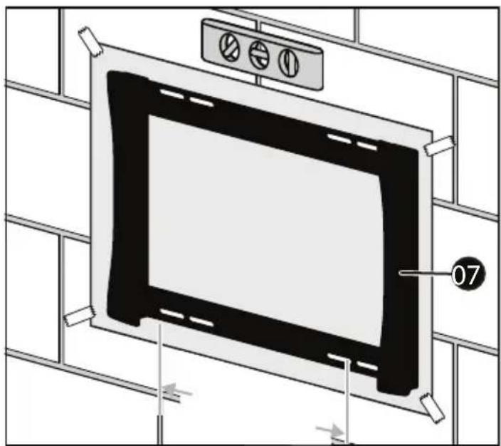 Technical diagram of a mounted appliance with labeled components and directional arrows indicating assembly or movement.