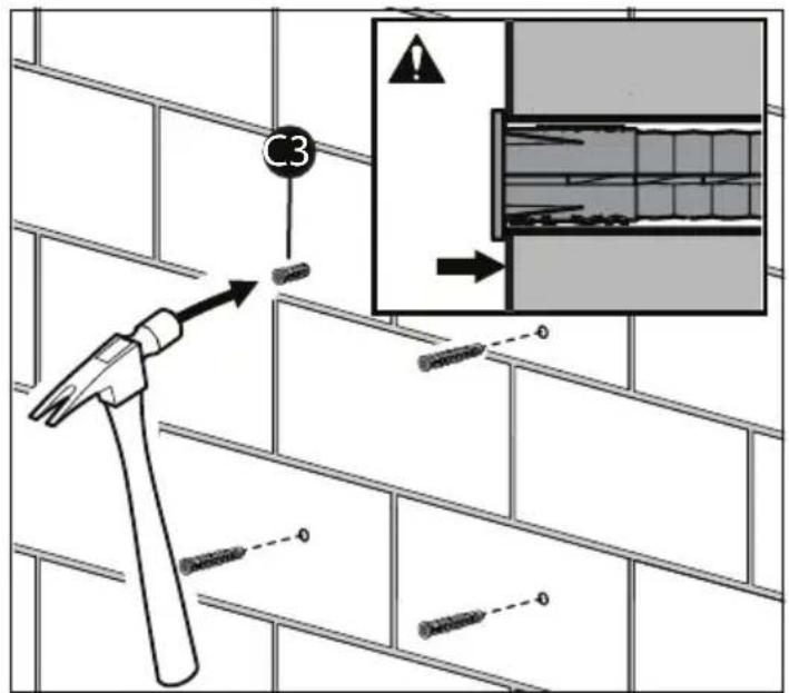 Diagram illustrating brick wall construction with a hammer and screwdriver, showing a warning label and magnified detail of a structural component.