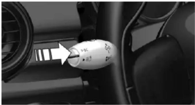 Close-up of a car intake manifold with a white plastic bulb inserted, showing the mode and direction (no text or symbols visible)