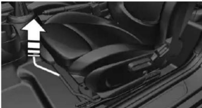 Close-up of a car's internal seatbelt mechanism with no visible text or symbols