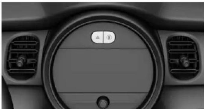 Interior view of a car dashboard with circular vent and side-mounted air filters (no visible text or symbols)