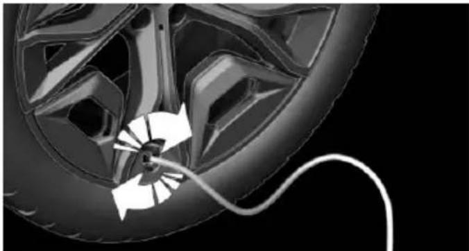 Diagram of a car wheel with a cable and directional arrow indicating motion (no text or symbols)